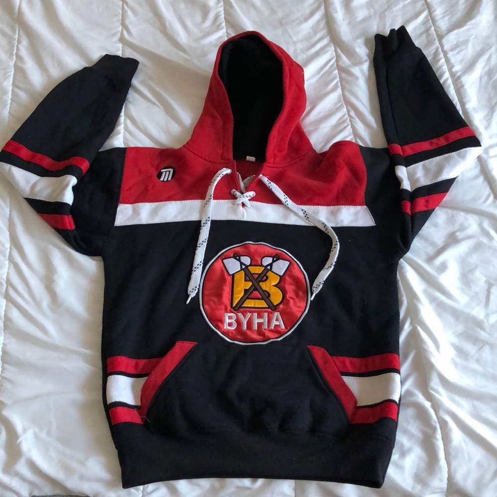 Youth Large hockey themed hoodie.